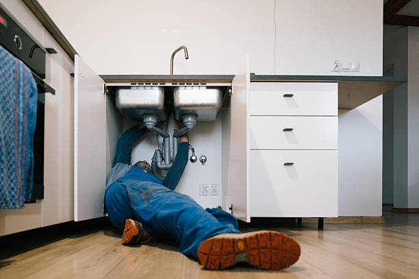 Professional Emergency Plumber technician working in Monson, MA